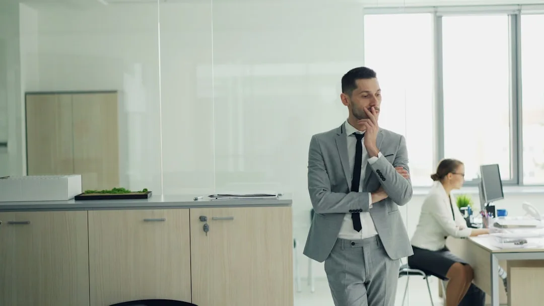 Business professional reviewing documents at desk
