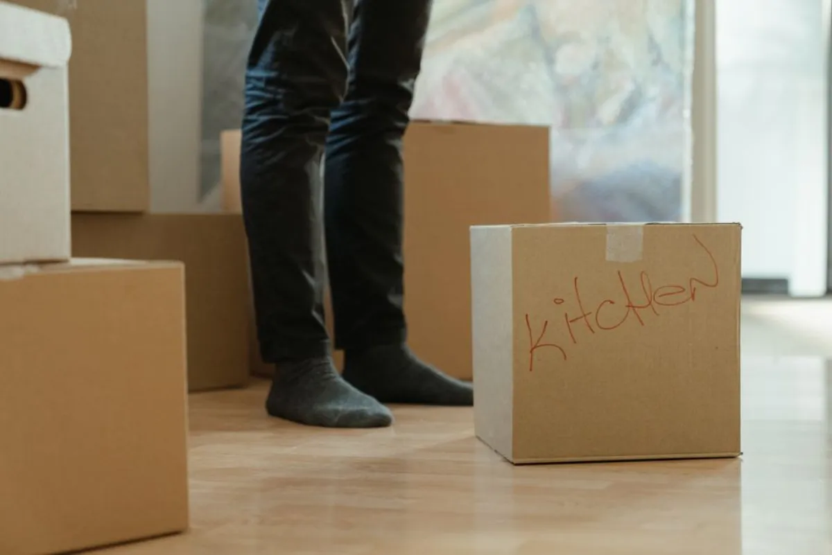 Packed moving boxes in a home preparing for family relocation