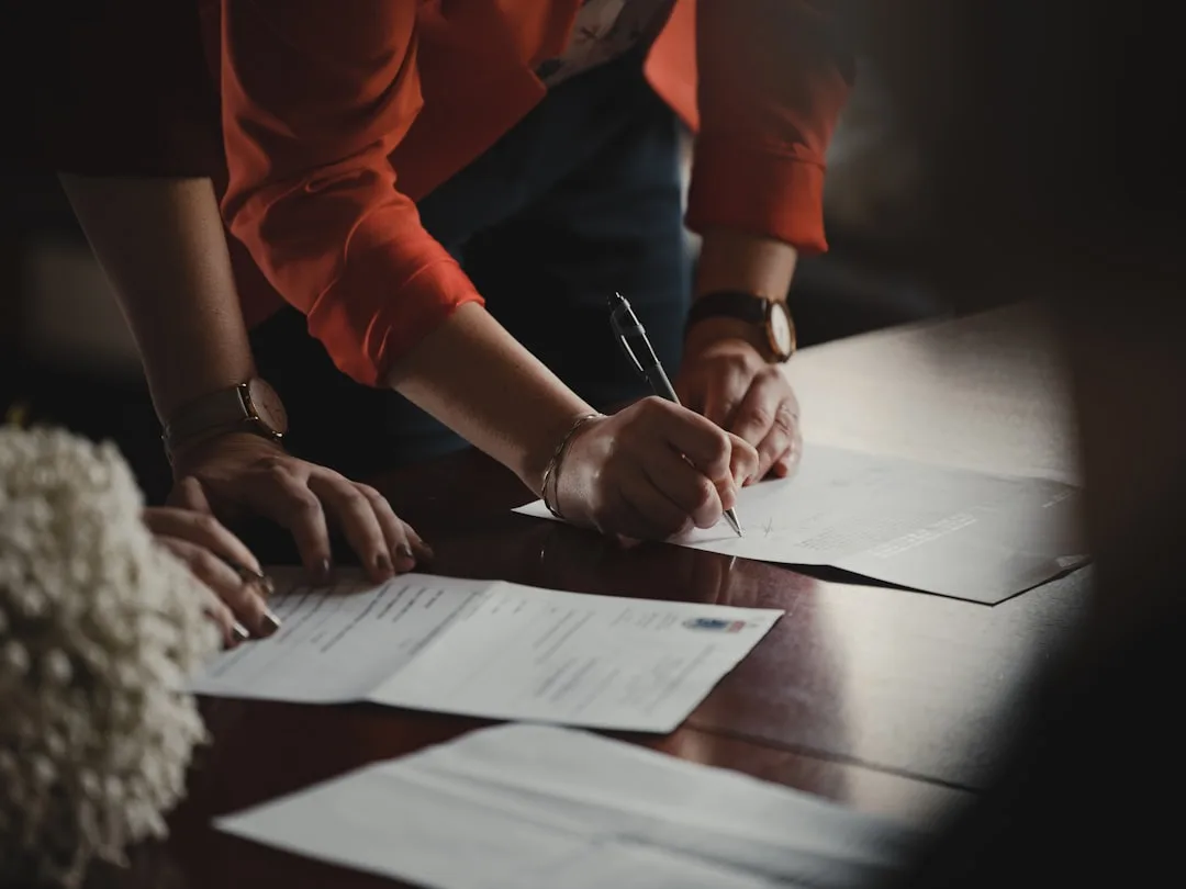 Legal team reviewing successor liability protections in funeral home acquisition