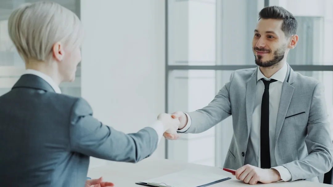 Professional business handshake in office meeting