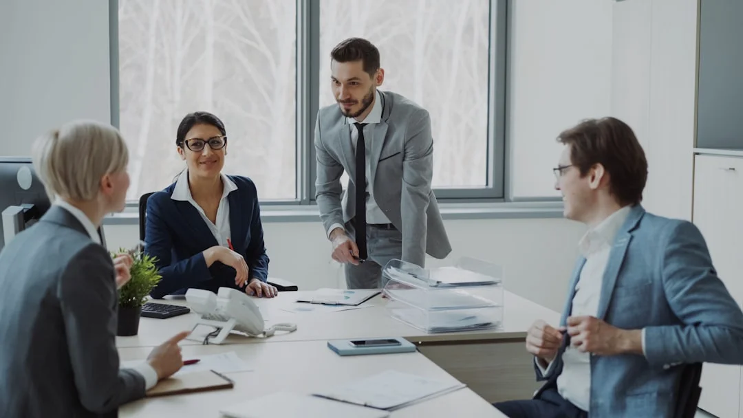 Professional advisory team meeting around a conference table
