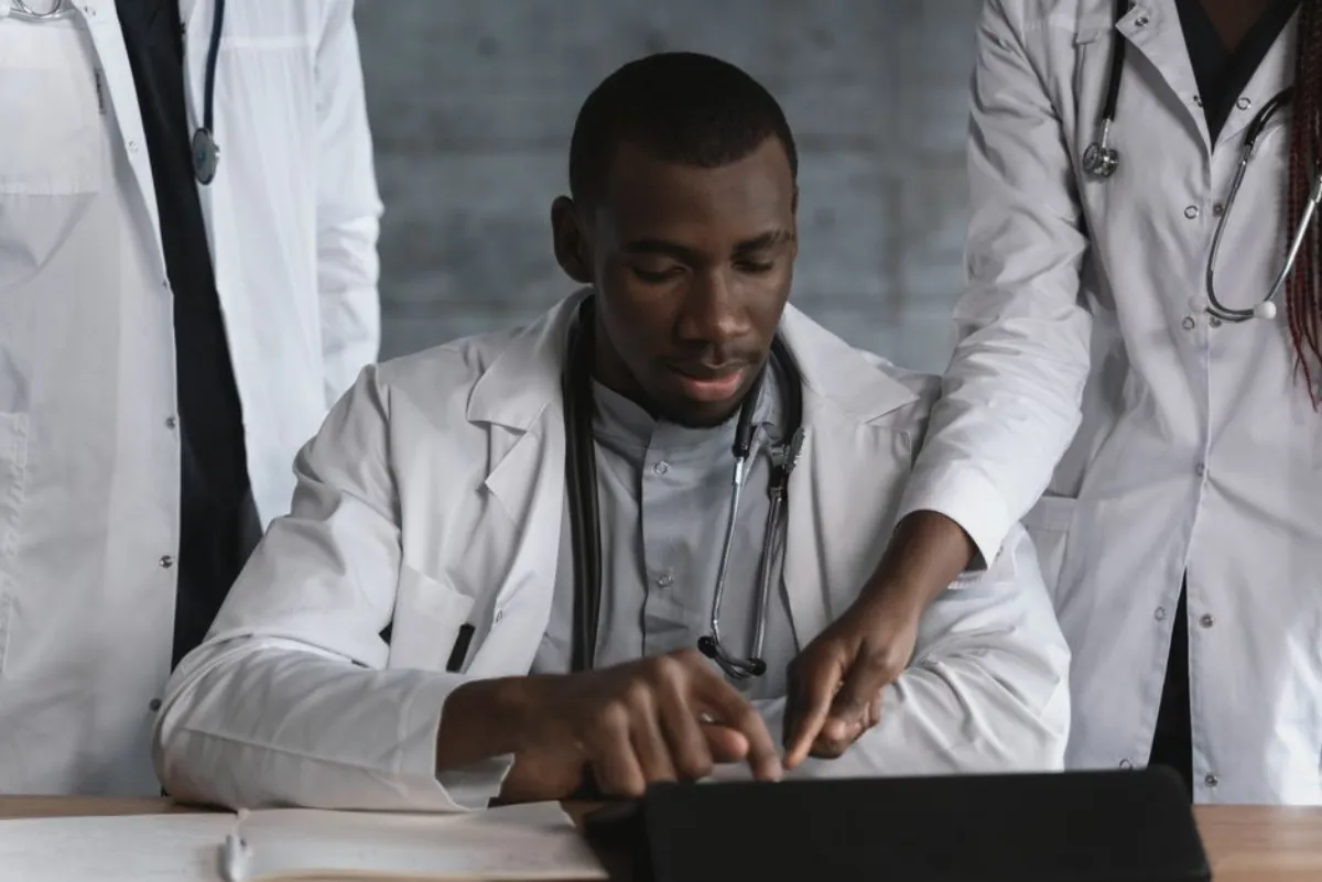 Healthcare professionals coordinating care plans in a team meeting