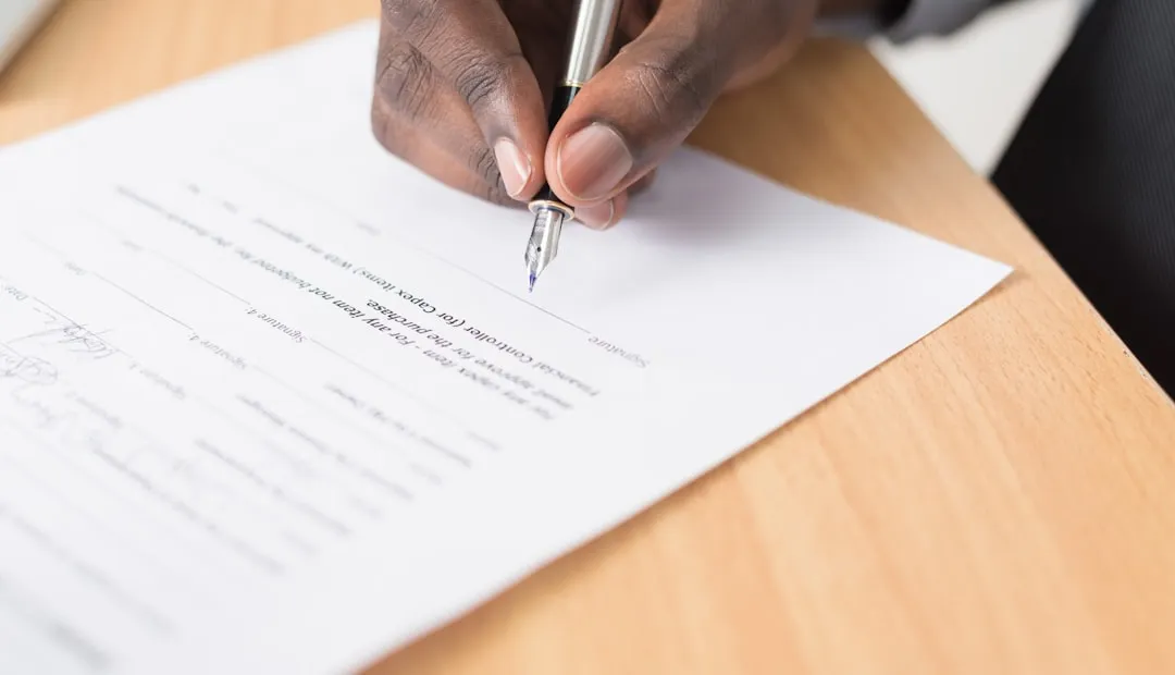 Legal authorization form with signature pen on a professional desk